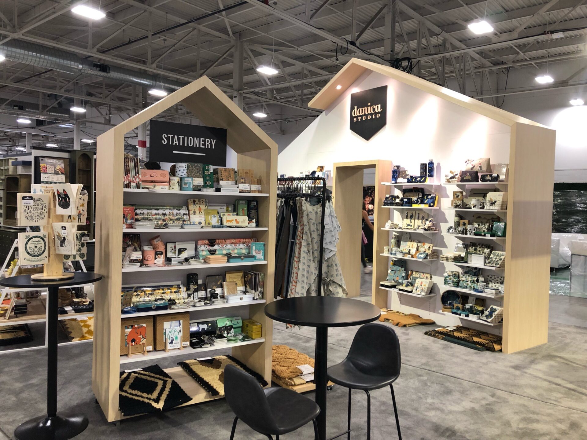 Danica trade show booth with wood and home decor/gifts