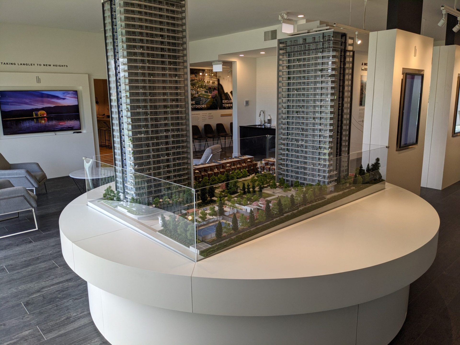 Latimer Heights towers sales center and showroom with miniature building representation