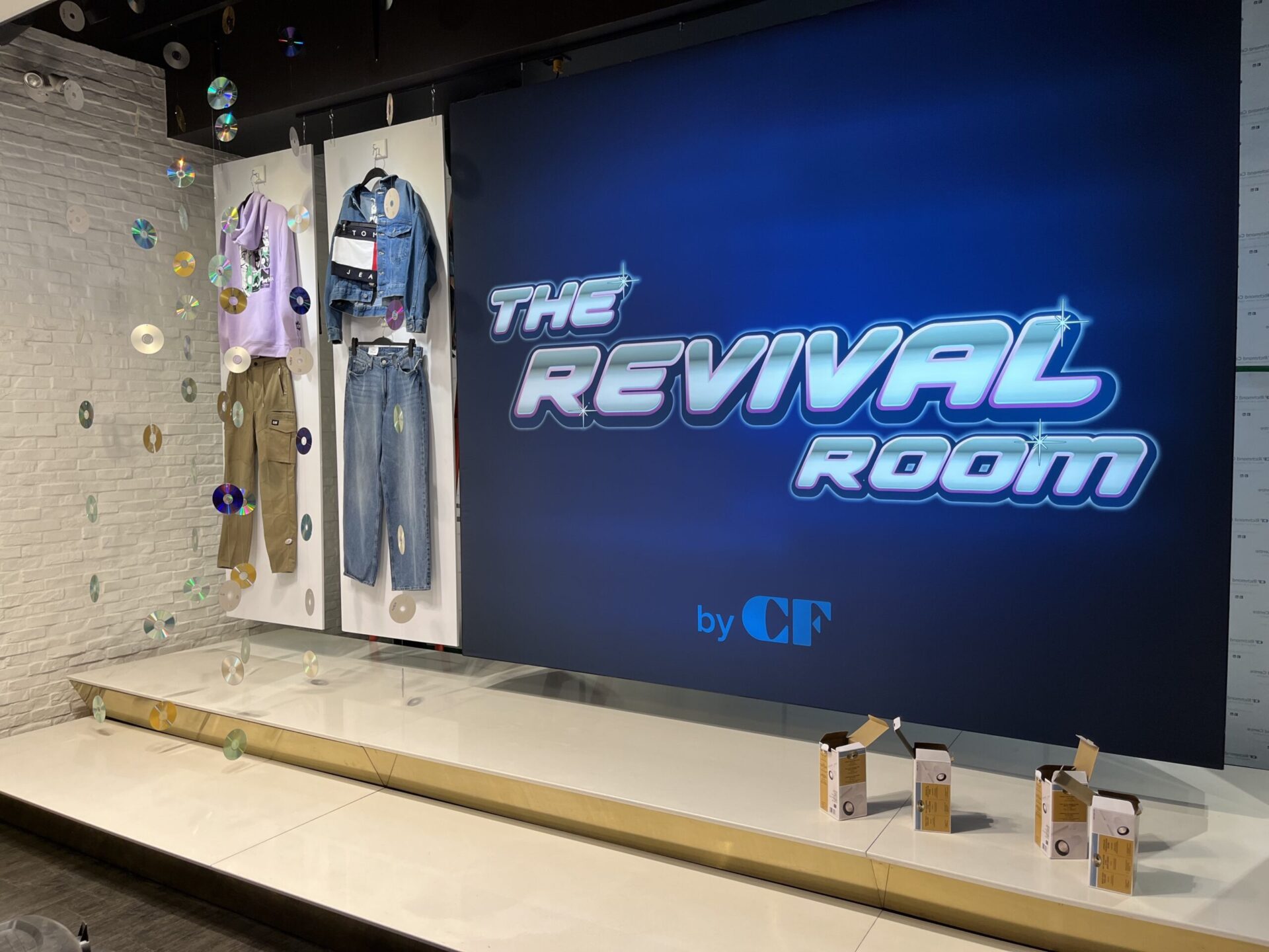 Cadilac Fairview 90s-influenced shopping experience with revival room wall
