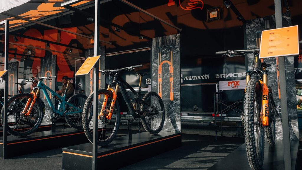 Fox and Marzocchi bike display showing bespoke fabrication and precision-crafted brand staging by Sequoia