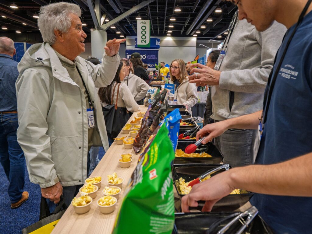 Magic Scoop sampling station crowd interaction at CHFA tradeshow