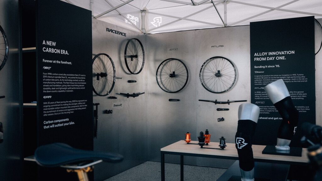 Race Face brand activation interior showing pre-show marketing pipeline built into the space