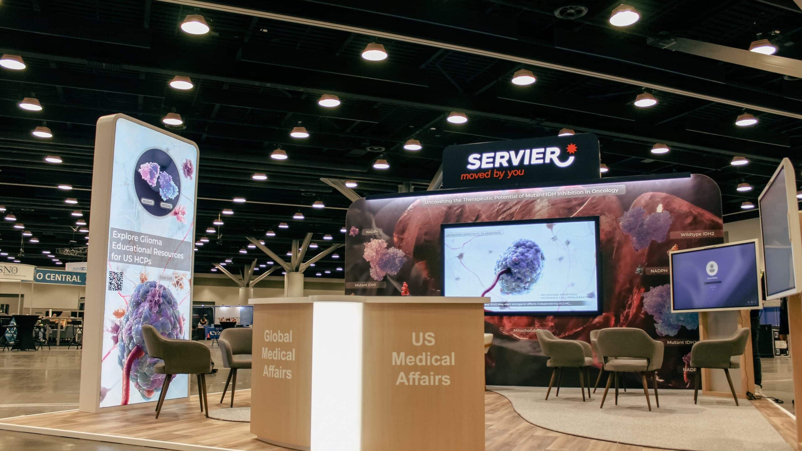 Vancouver Canucks trade show booth interior with staff engaging attendees