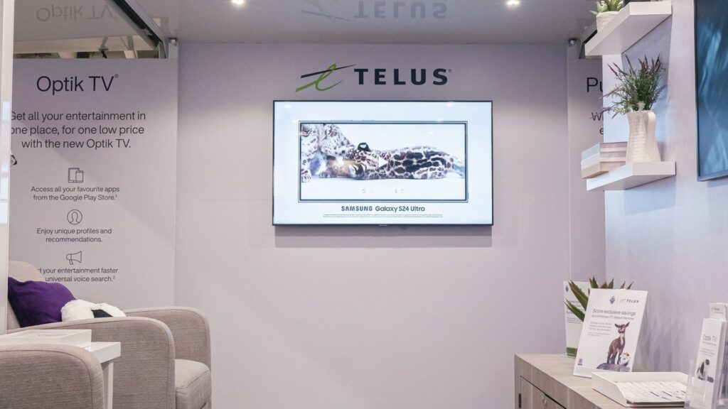 TELUS Optik mobile tour interior showing spatial design with focal point and lounge seating